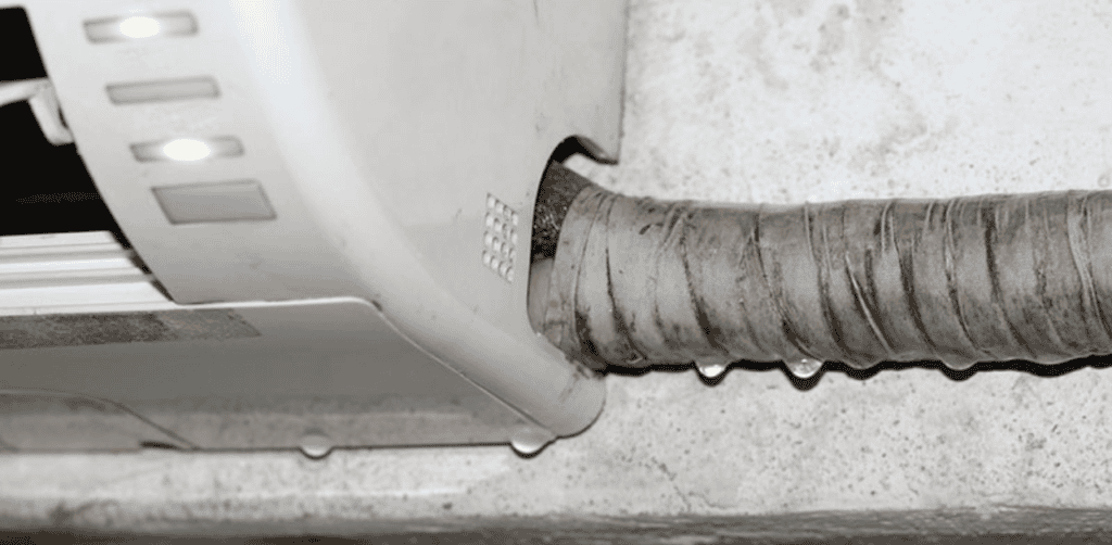 Professional HVAC technician repairing a leaking evaporator coil in an air conditioner, using specialized tools to stop refrigerant leaks and restore cooling efficiency.